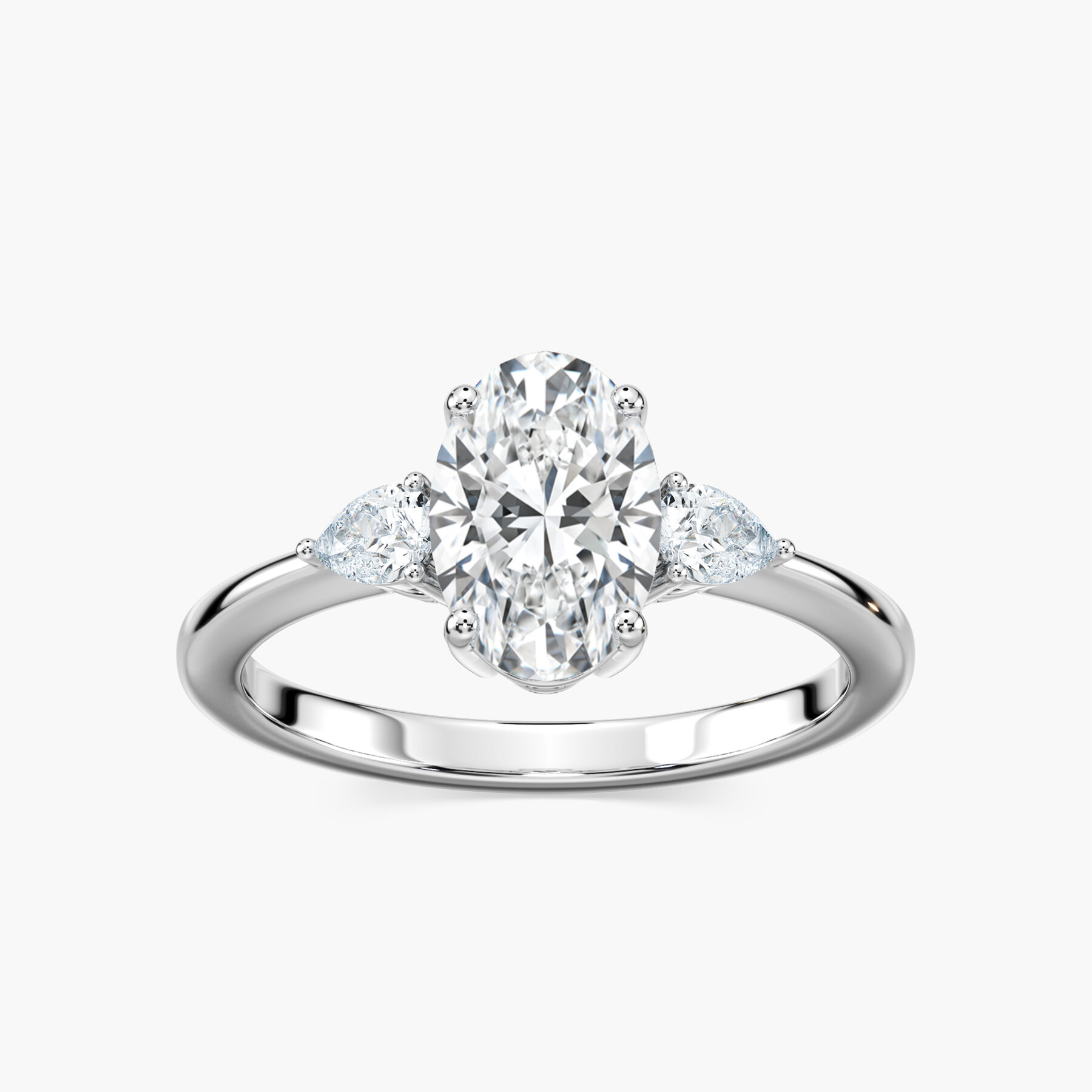 1.50 Carat Oval Flourish Three Stone Ring