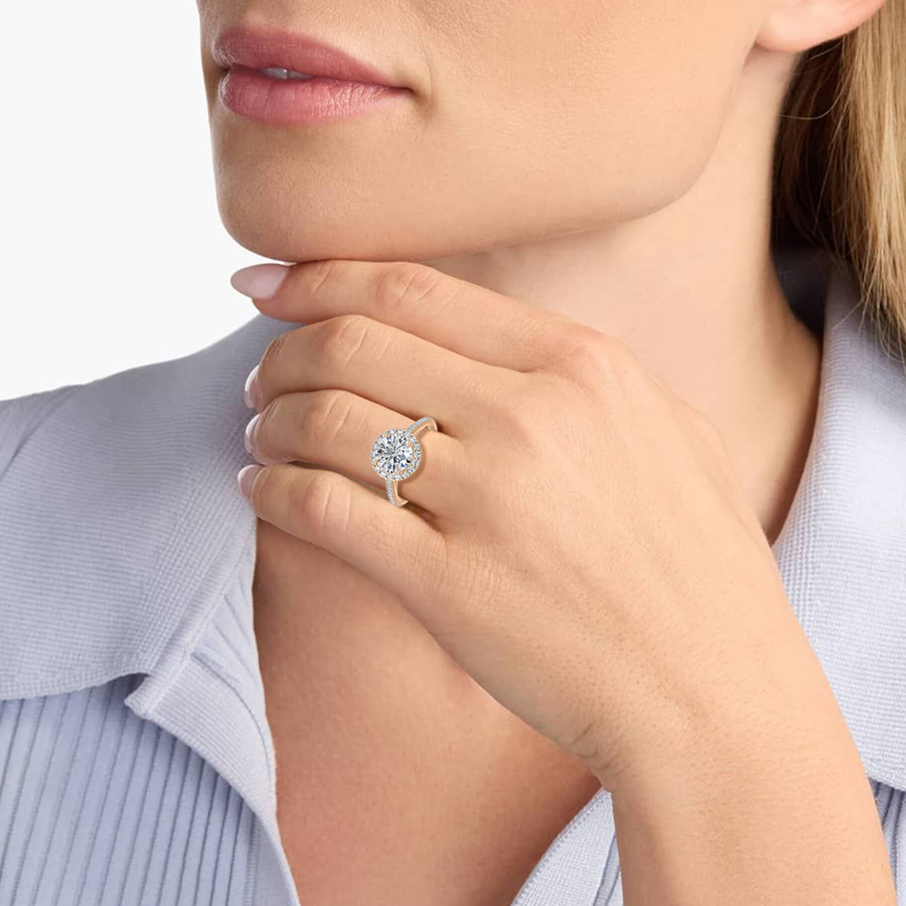 rose gold round diamond halo ring with side stones