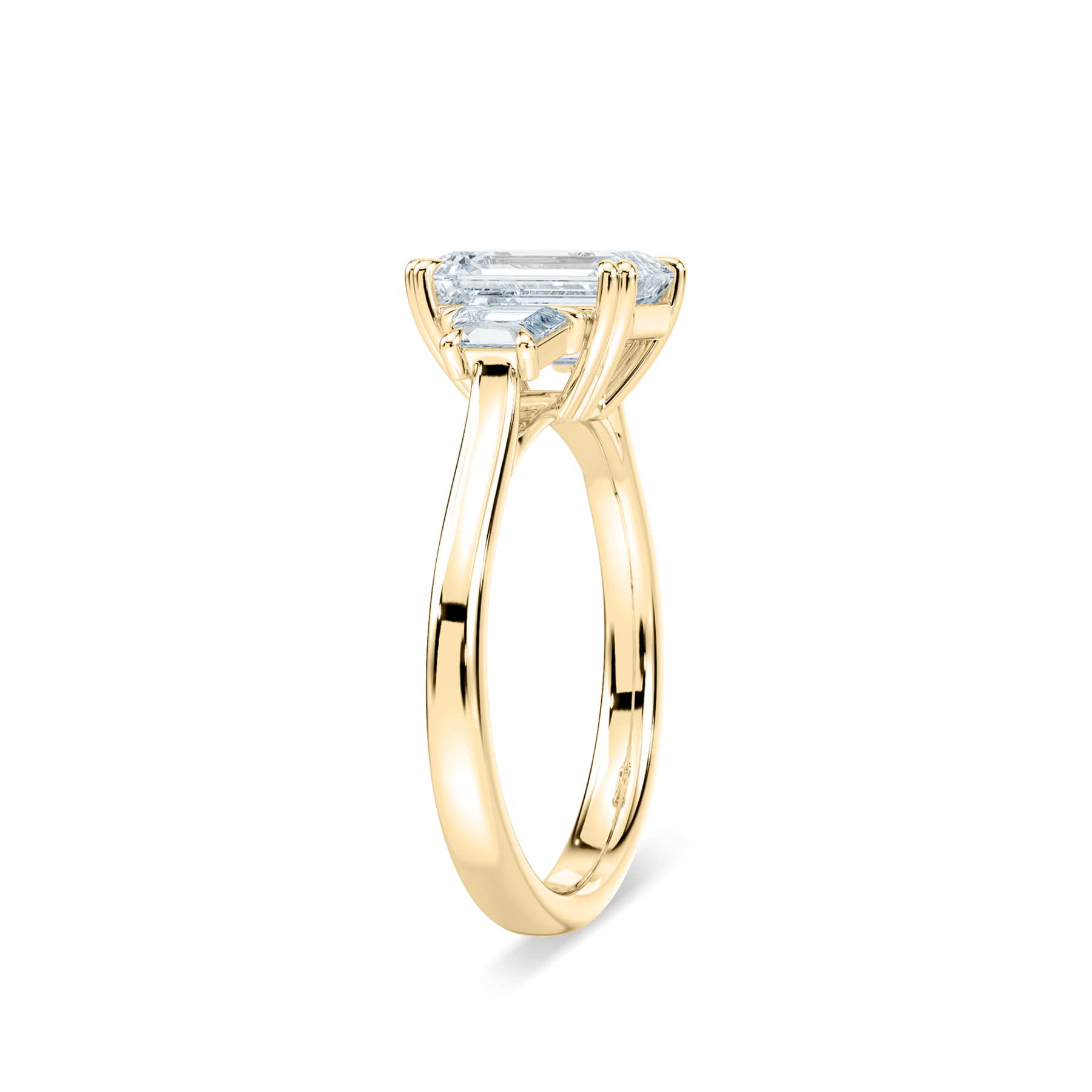 2.50 Carat Emerald And Trapezoid Cedric Three Stone Ring 